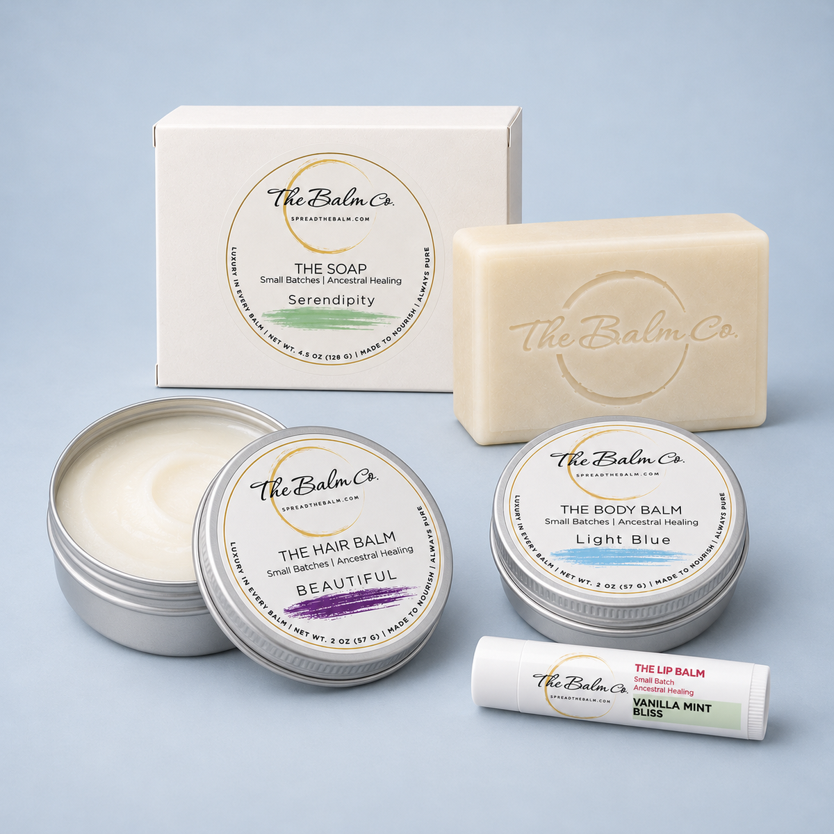 The Travel Care Set with The Body Balm, The Hair Balm, The Lip Balm and The Soap by The Balm Co.